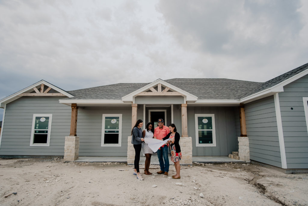Agape Ranch team members review development plans at The Ranch in Corpus Christi, Texas. 