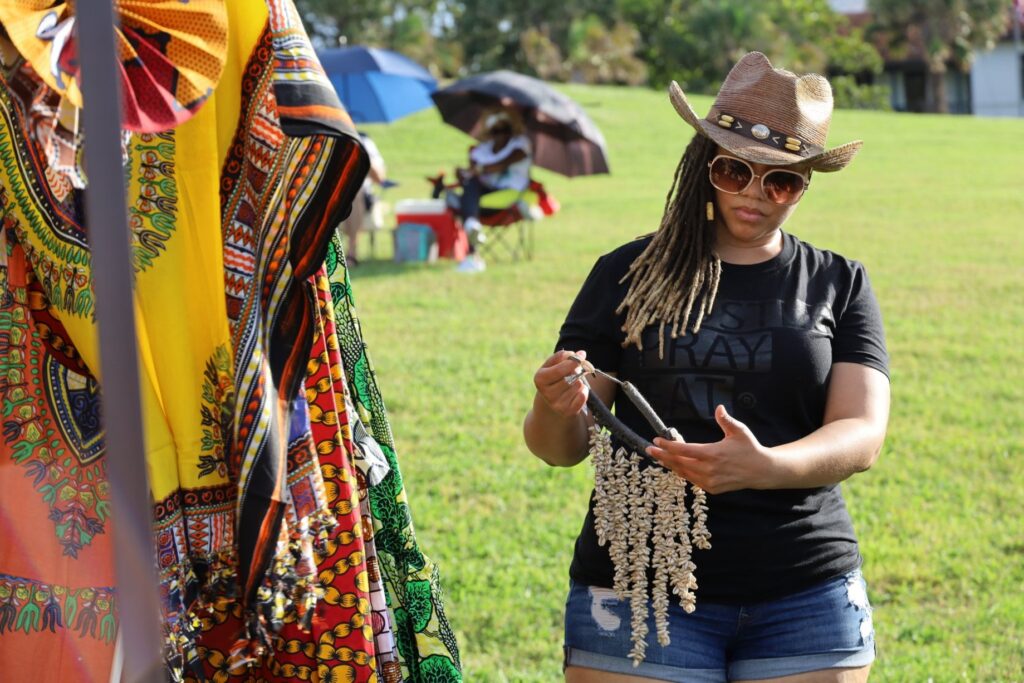 Local vendor and shopper in Corpus Christi, Texas at the Juneteenth Festival.