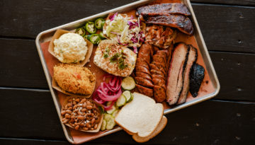 A spread of barbecue and sides from Butters BBQ is located in Sinton, Texas.