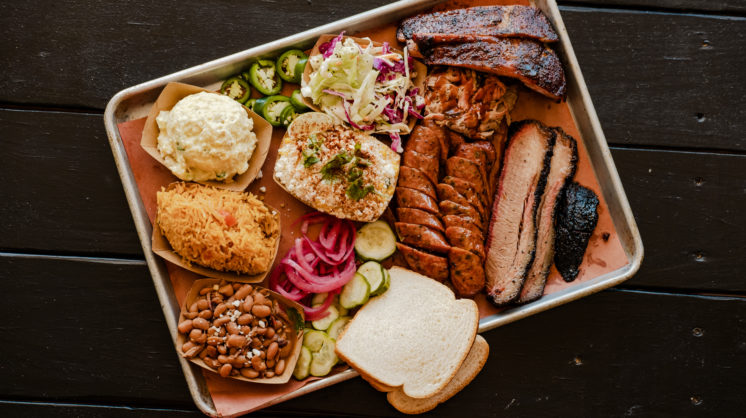 A spread of barbecue and sides from Butters BBQ is located in Sinton, Texas.