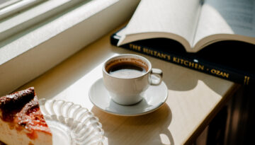 A cup of coffee and homemade cheesecake from Cafe Calypso at their new Starr St. location in downtown Corpus Christi.