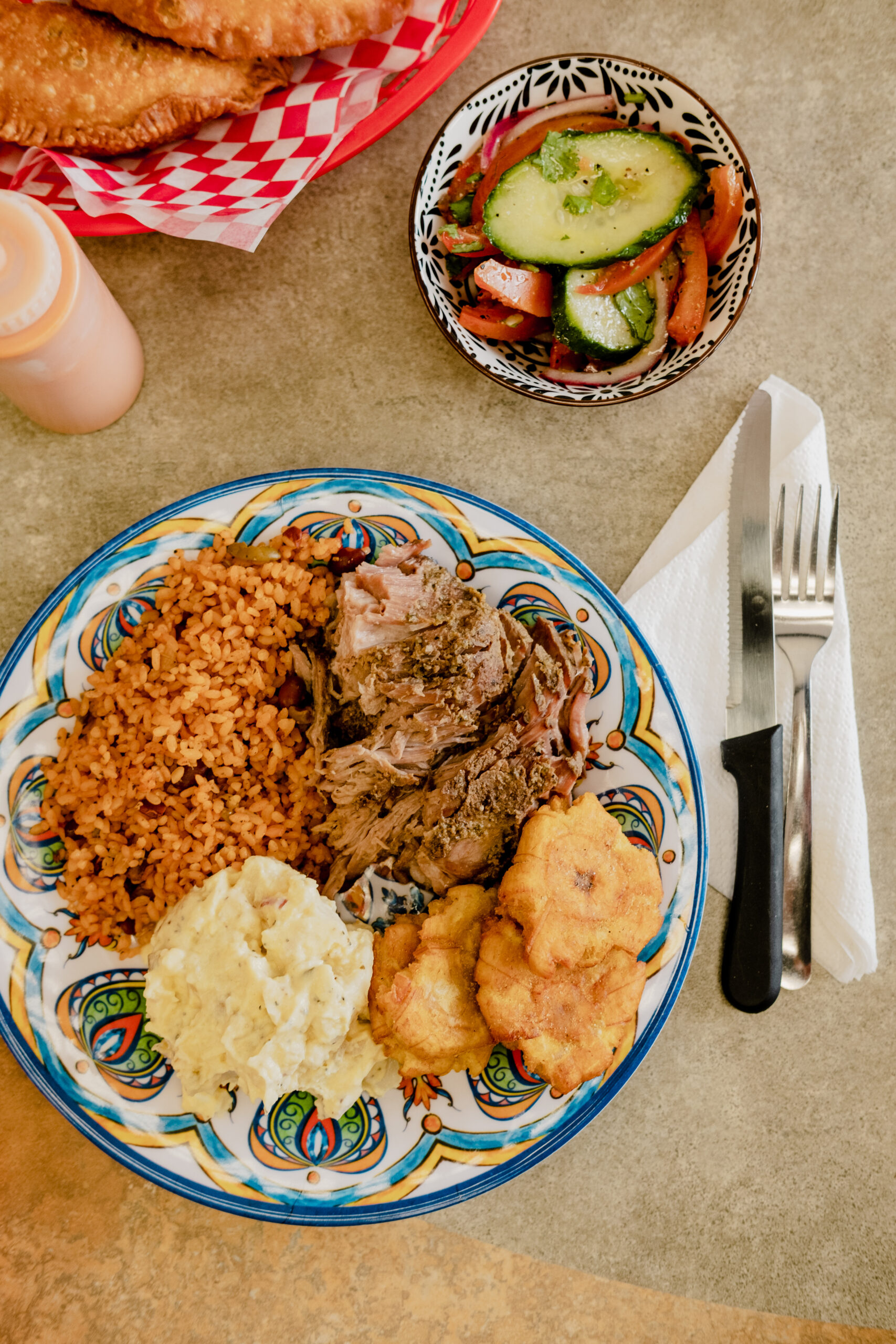 A table at El Taino with a savory dish, bringing a taste of Puerto Rico to Corpus Christi's South Side.