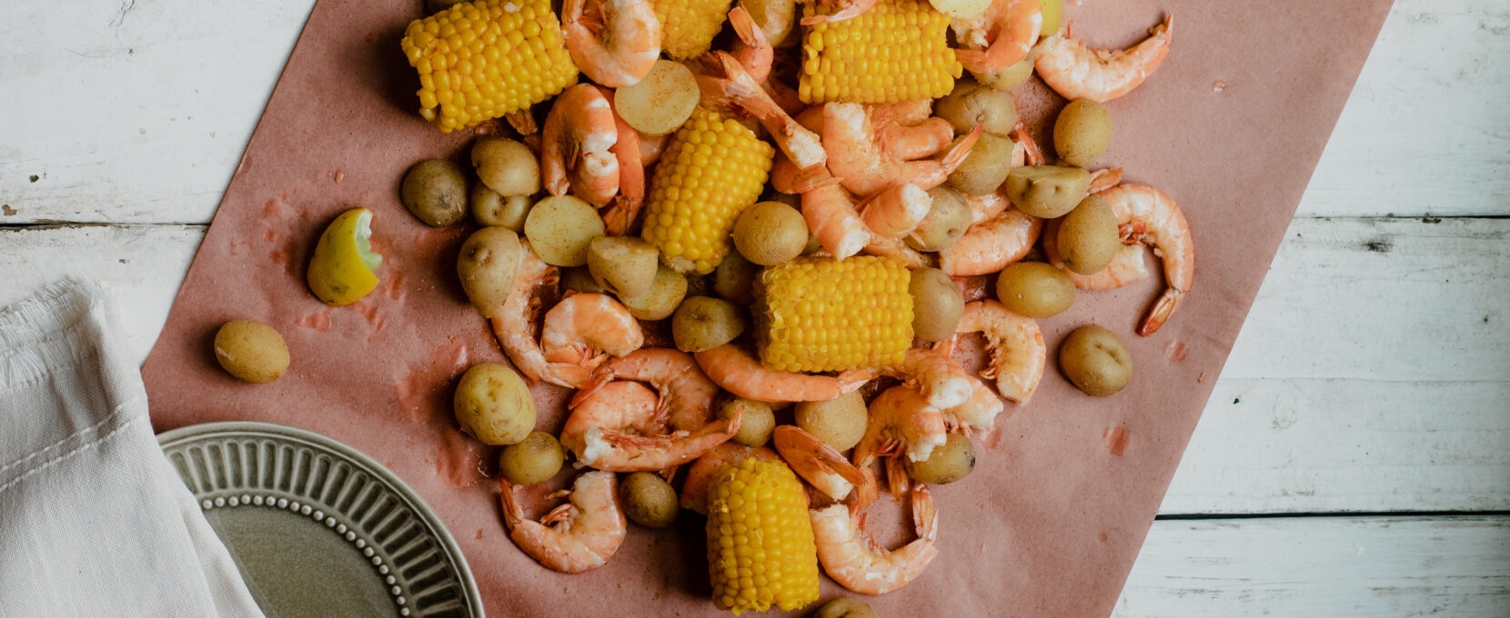 A fresh shrimp boil on the table. Two easy summer recipes for the family.