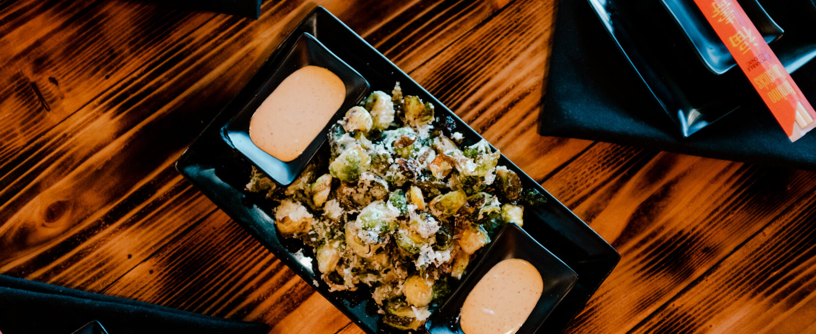 Roaming Ronin's Brussels Bites, one of our 5 best Brussel Sprouts Dishes in the Coastal Bend.