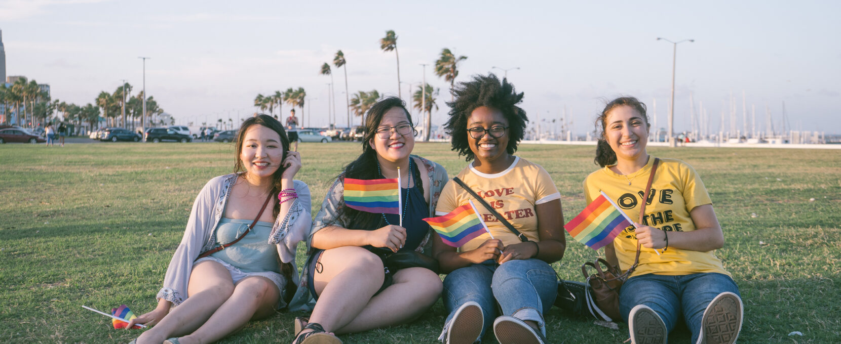 A group of individuals post for a photo to celebrate Pride Month in Corpus Christi, Texas.