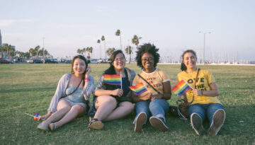 A group of individuals post for a photo to celebrate Pride Month in Corpus Christi, Texas.