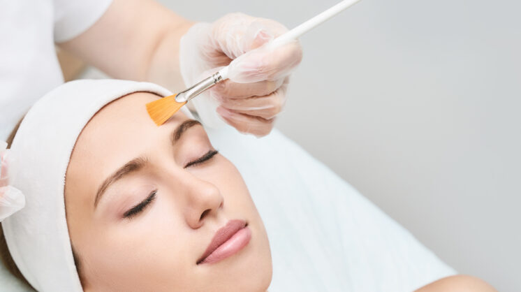 Shutterstock image of woman receiving a Now Experiencing: Faux-tox Facial.
