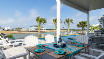 patio overlooking the water at a house at The Reserve