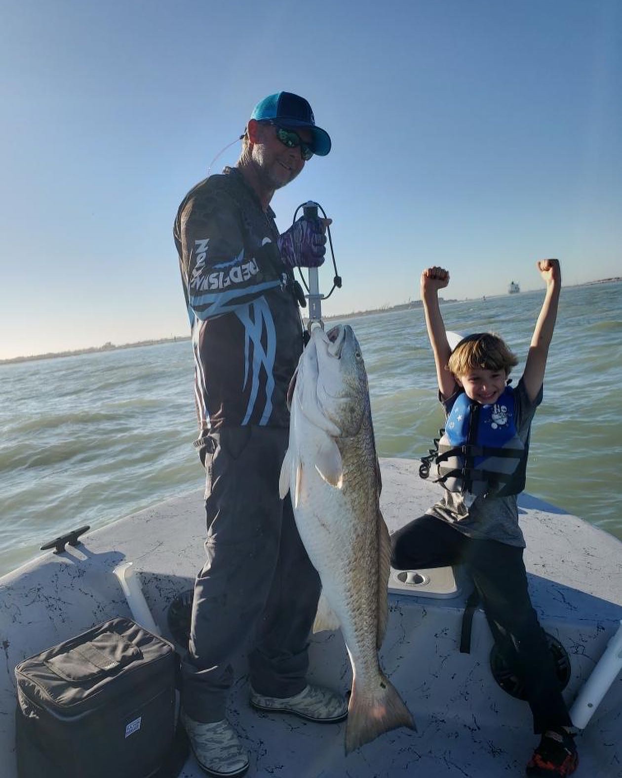 catching redfish with Red Tag Guide Service