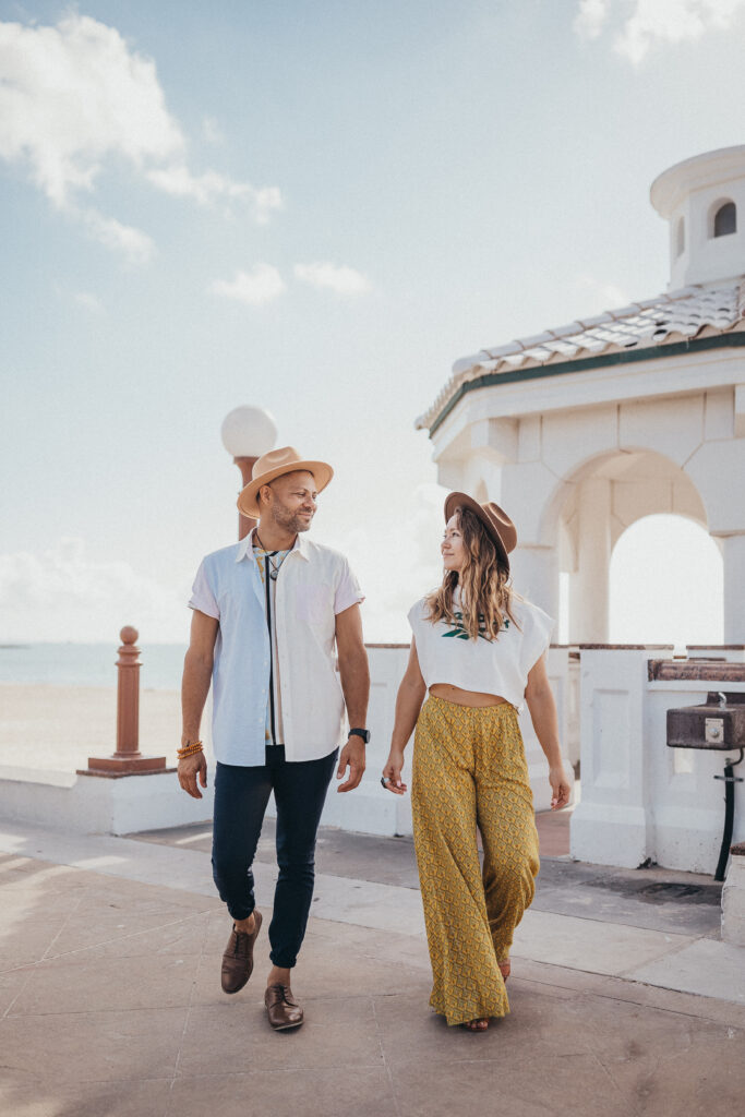 A photo of Davis and Bellocchio on a pier off the beach.
