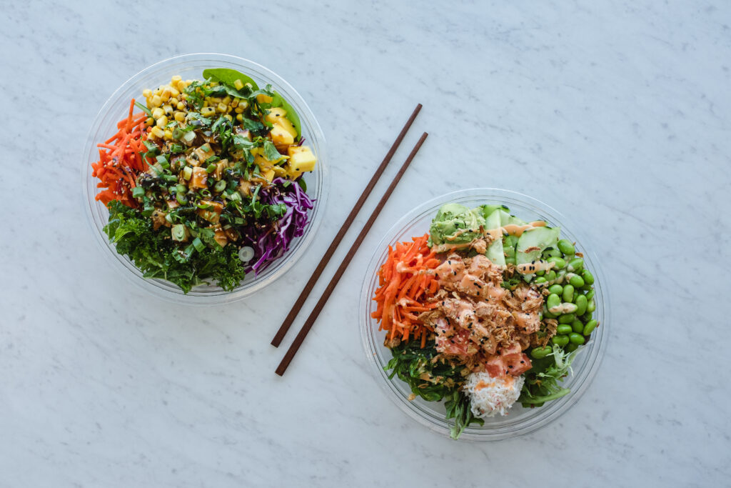 Two poke bowls from Hanaya Poke in Corpus Christi, Texas