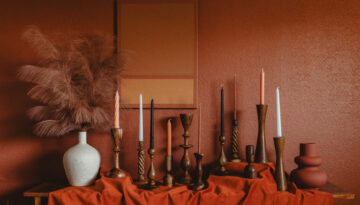 A candlestick collection sourced from local shops in Corpus Christi, Texas.