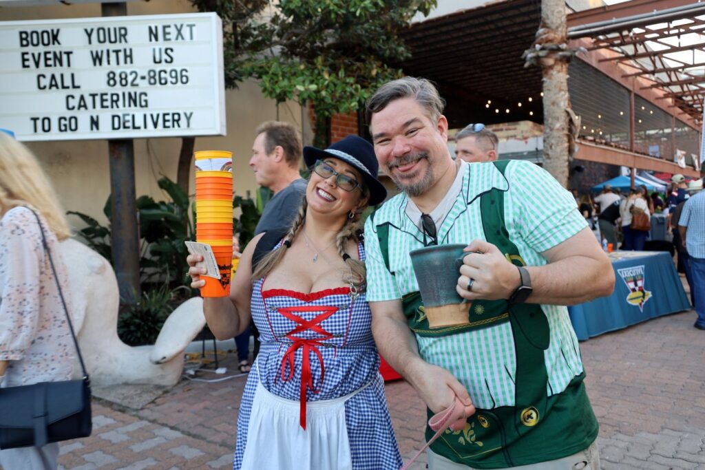 A couple poses at Surftoberfest in Corpus Christi, Texas.