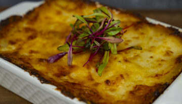 Potatoes au gratin from Champs Meat Market’s new side dish menu.