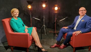 Averyt sits with Rockport Center for the Arts Executive Director Luis Púron