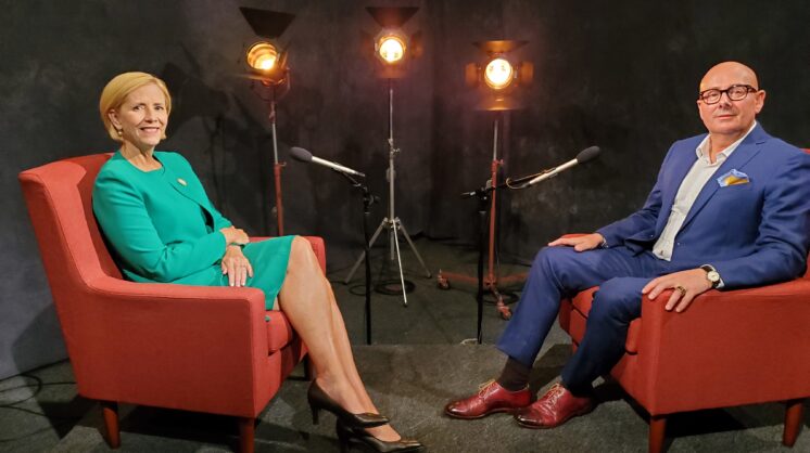 Averyt sits with Rockport Center for the Arts Executive Director Luis Púron