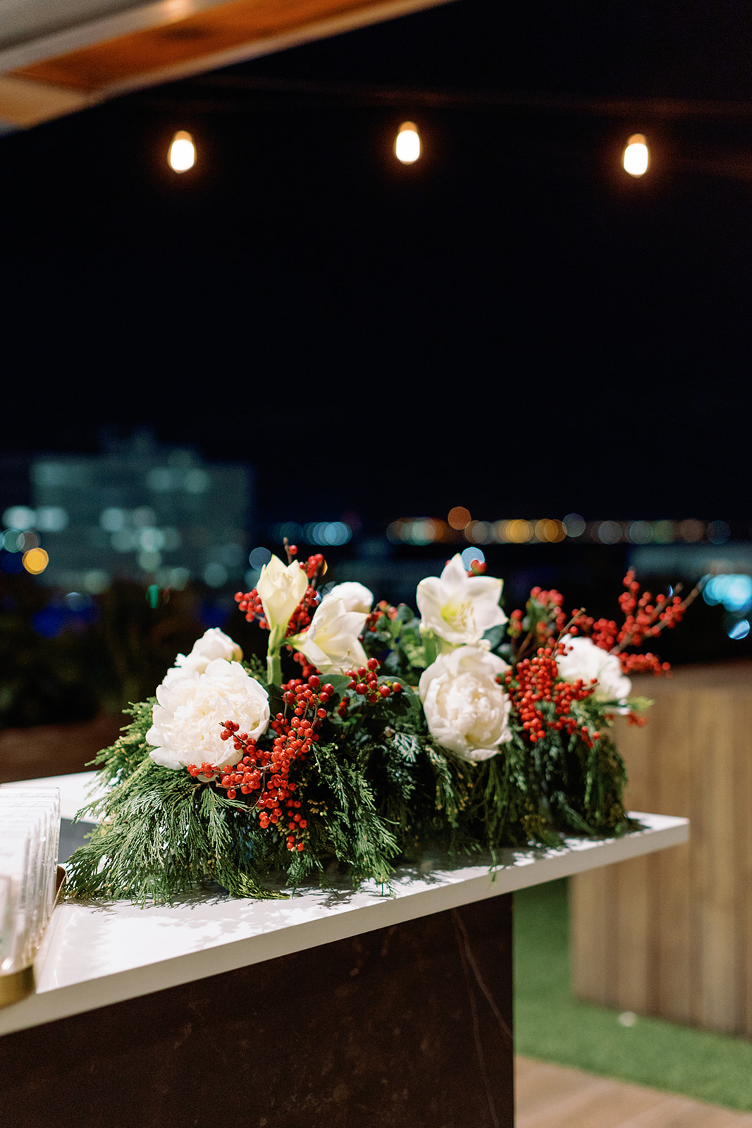 Photo of a floral arrangement from Always in Bloom at a Christmas dinner at The Beacon 