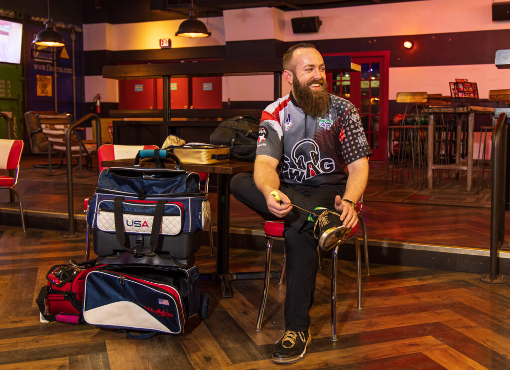 Colton Bartel, a PBA player, sits inside a bowling alley in Corpus Christi, Texas and poses for a photo. 