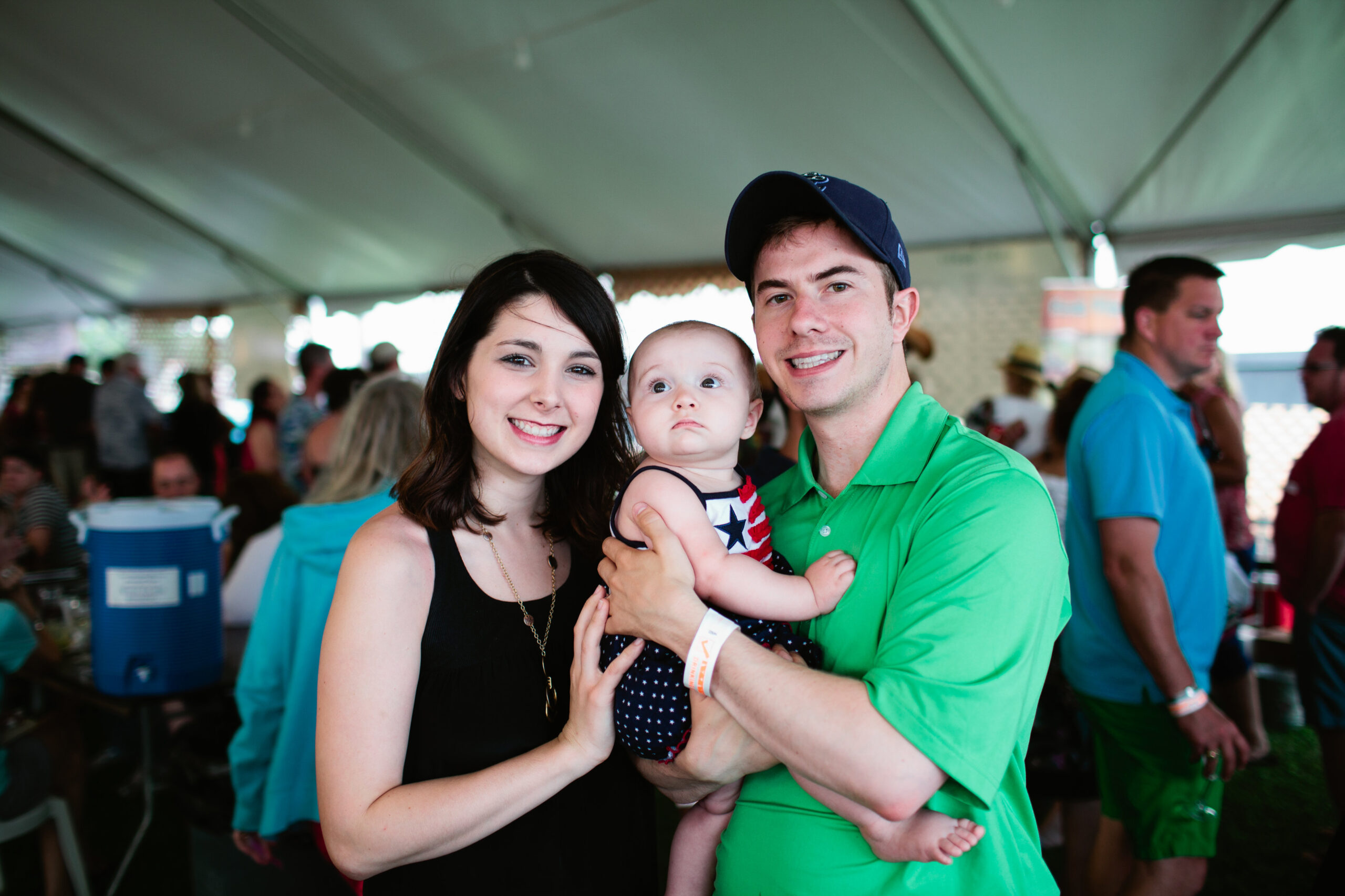 The Bend owners Jordan and Kaley Regas pose for a photo with their daughter in 2014. 