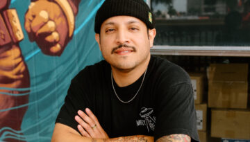 Photo of Martin Flores, owner of Marty McPies, in front of his new restaurant