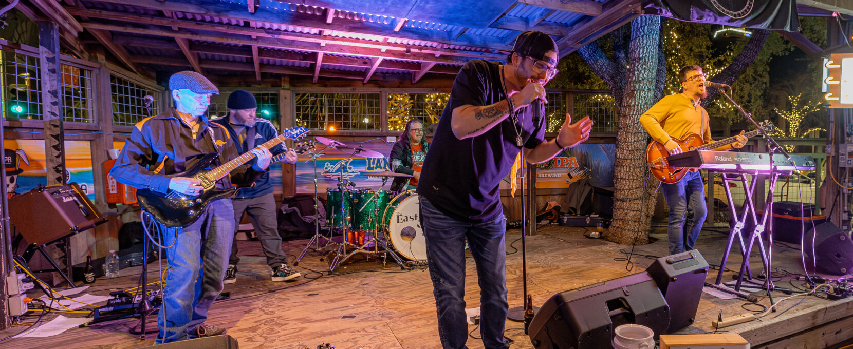 The East and the Crow rock out on stage together during a show at Executive Surf Club in Corpus Christi, Texas.
