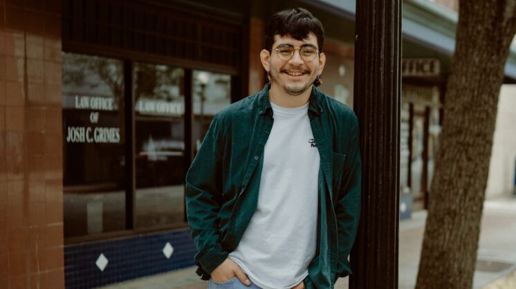 Local artist Joey Gonzales poses for a photo in Corpus Christi, Texas. | Photo by Levi Guzman