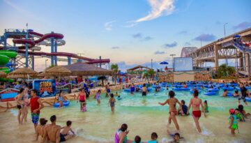 A large crowd of swimmers at Hurricane Alley Waterpark in Corpus Christi, Texas.