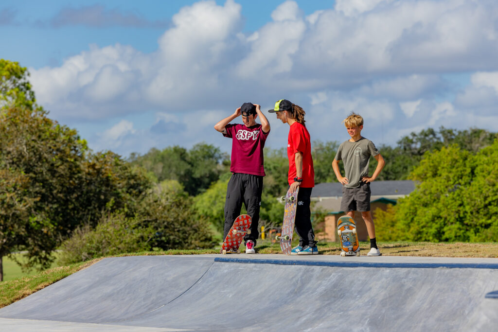 Boys wait to drop in with their skateboards at the new West Guth Skatepark in Corpus Christi, Texas.