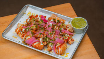 A platter of dressed chicharrones from BUS Tasty Bites in Downtown Corpus Christi.