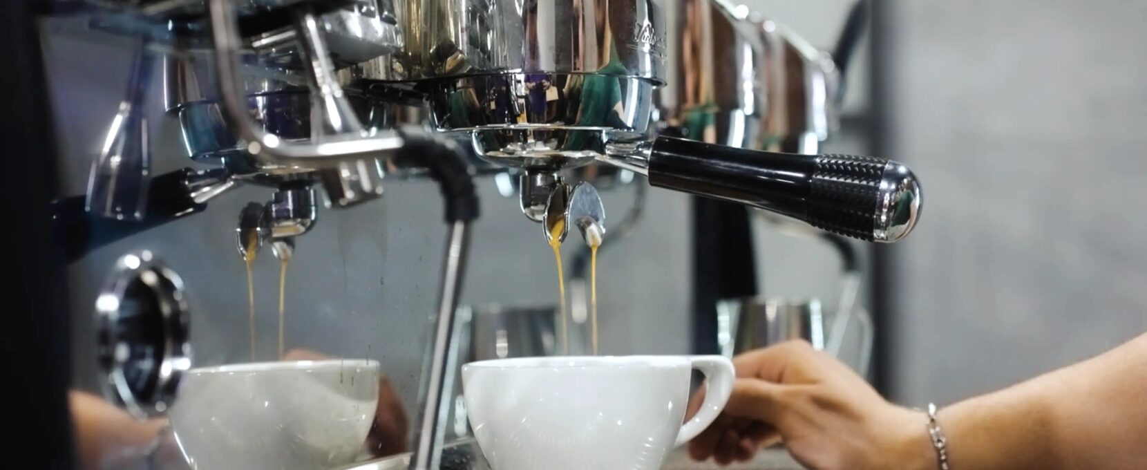 Grind Coffee employee pulls an espresso shot at the new location located uptown in Corpus Christi, Texas.
