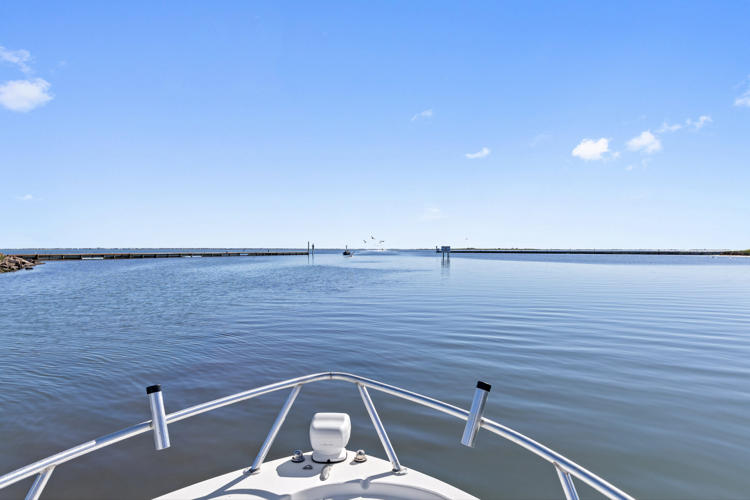 photo of a boat in the Laguna Madre at Bluff's Landing Marina & Lodge
