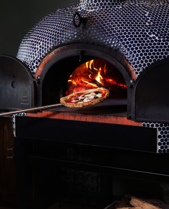 photo of the pizza and pizza oven at Odi's Pizzeria