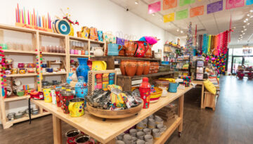 Shelves of merchandise inside one of the best places to shop in Corpus Christi, Sew Bonita.
