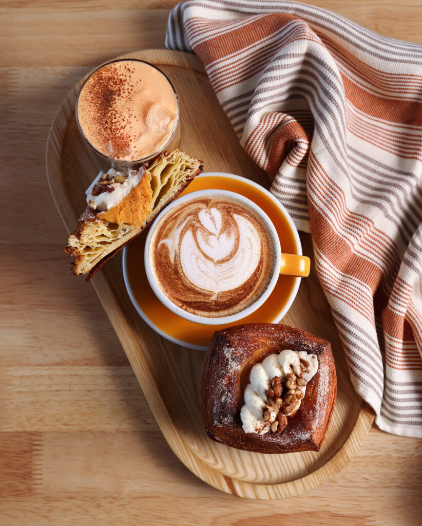 Pumpkin spice flavored pastries and coffee on a table at Fika in Corpus Christi.