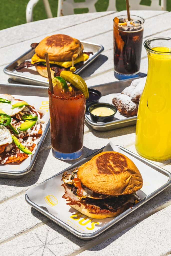 An array of brunch dishes and cocktails at BUS in downtown Corpus Christi.