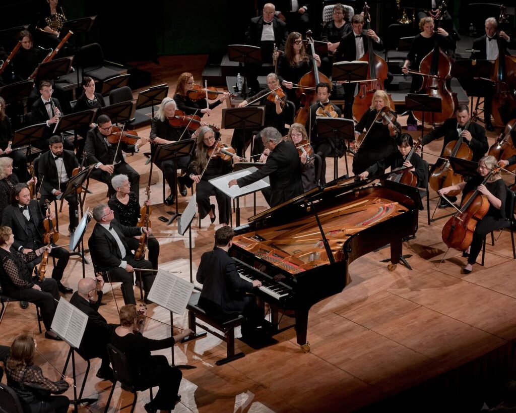 The Corpus Christi Symphony Orchestra live on stage in the Performing Arts Center.