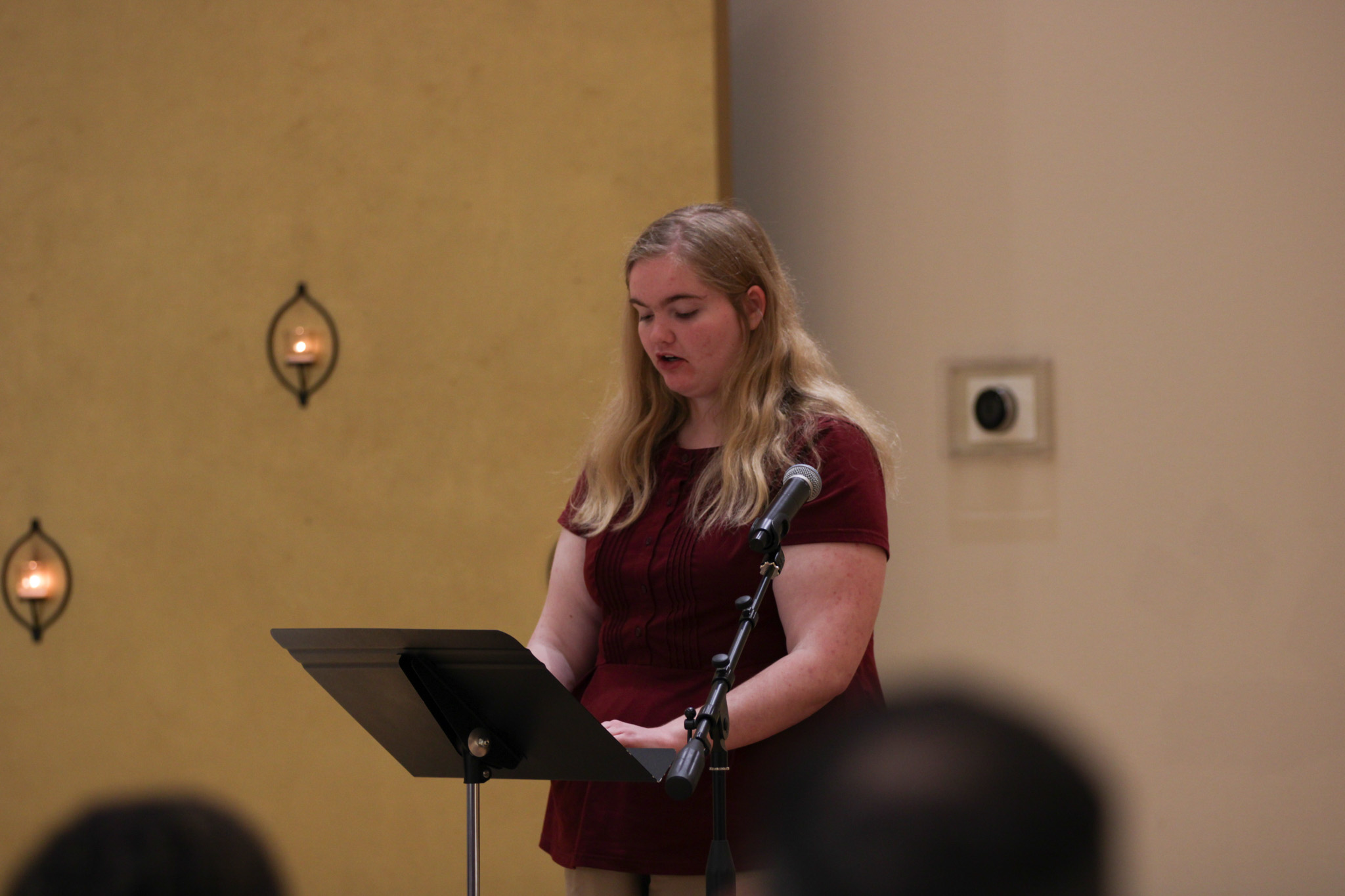 Annora Bailey a senior High School student reads out her Poem "Wizard Lizard".