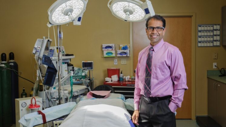 Dr. Vijay Bindingnavele poses in his operating room in Corpus Chrisit, Texas.