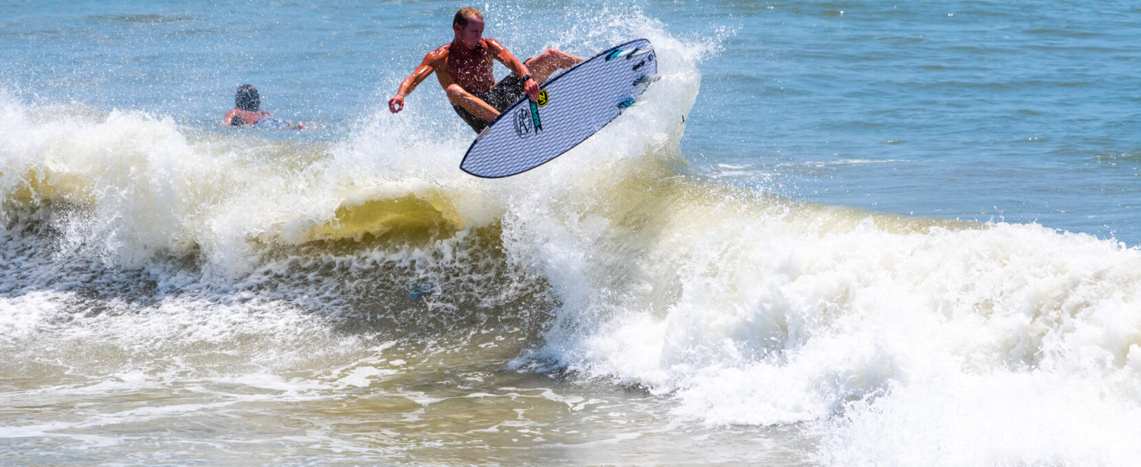 A surfer in Corpus Christi, Texas.