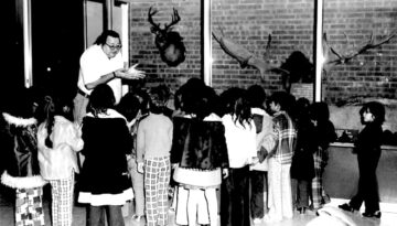 Aalbert Heine, director of the Corpus Christi Museum gives a tour to children.