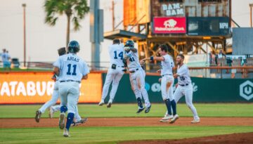The Corpus Christi Hooks celebrate a great play.