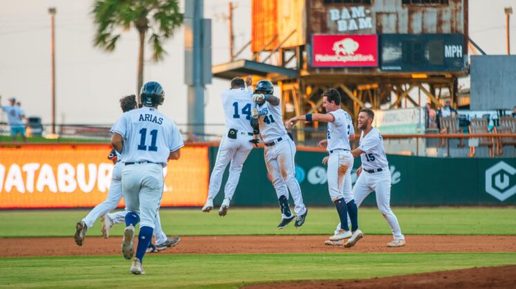 The Corpus Christi Hooks celebrate a great play.
