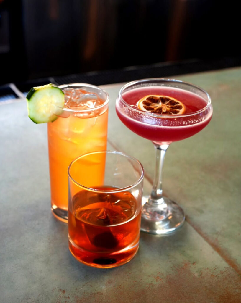 Cocktails at BUS on a table in Corpus Christi.