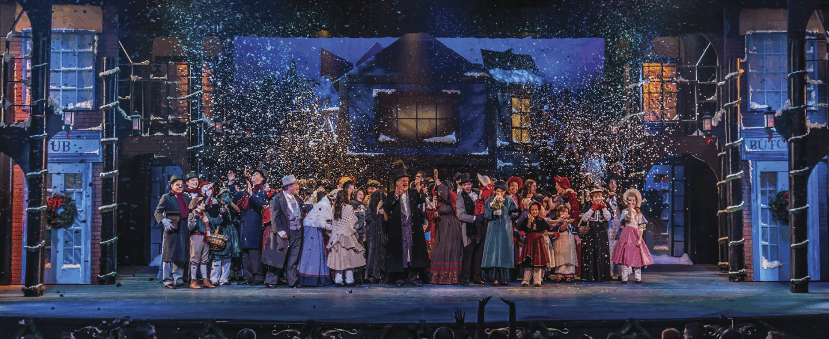 The cast of "A Christmas Carol" live on stage at the Harbor Playhouse in Corpus Christi, Texas.