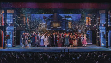 The cast of "A Christmas Carol" live on stage at the Harbor Playhouse in Corpus Christi, Texas.