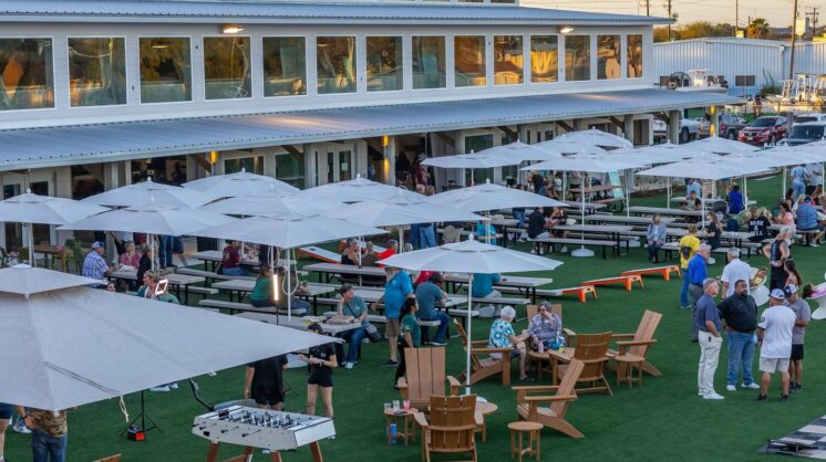 An aerial view of a crowd in the open air venue inside Fifth & Elm.