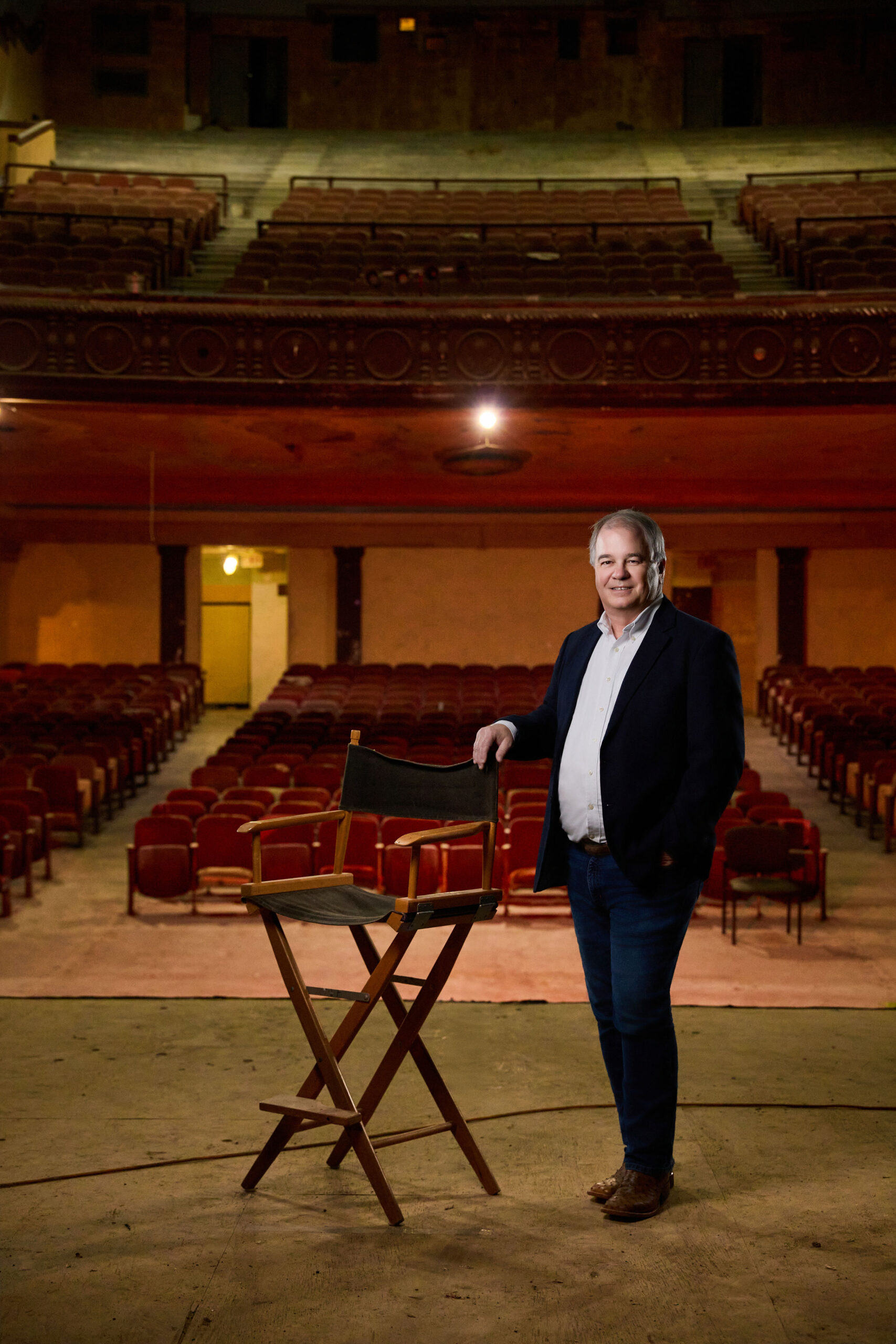 The Ritz Theatre’s new Executive Director Arthur Seago smiles for a picture inside the theatre.