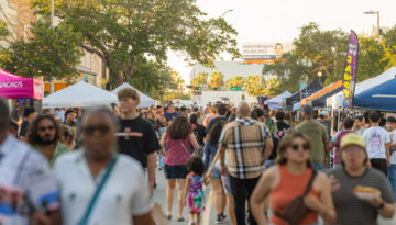People walking in downtown Corpus Christi during ArtWalk.
