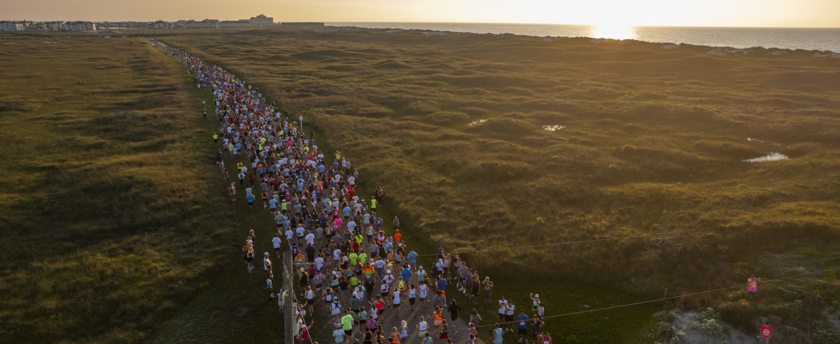 An aerial shot of runners during Beach to Bay in Corpus Christi, Texas.