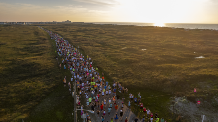 An aerial shot of runners during Beach to Bay in Corpus Christi, Texas.